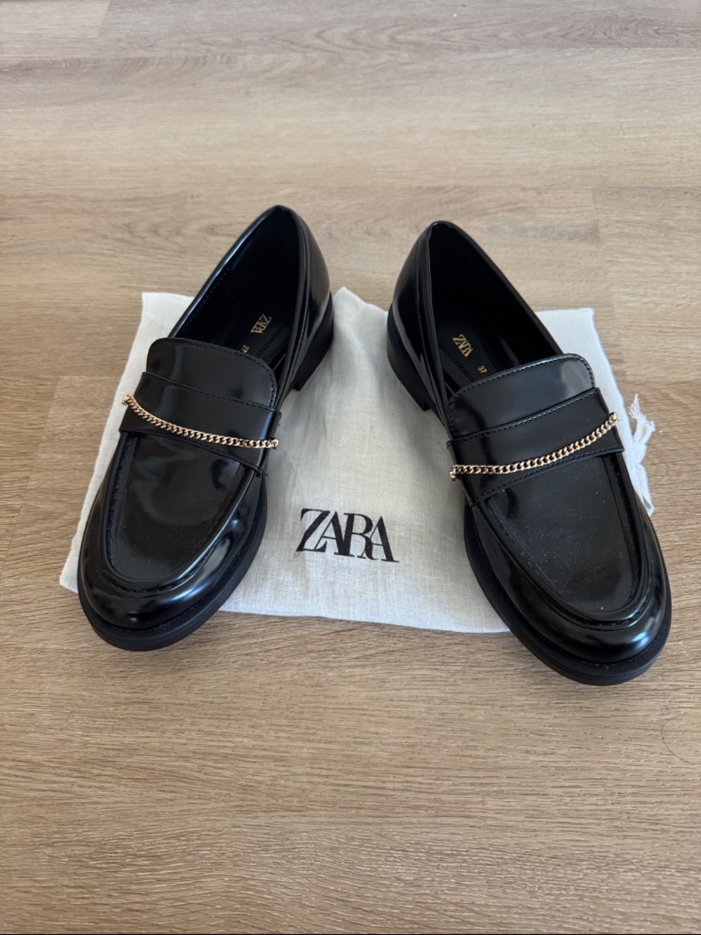 ZARA Black Patent Loafers with Gold Chain Accent